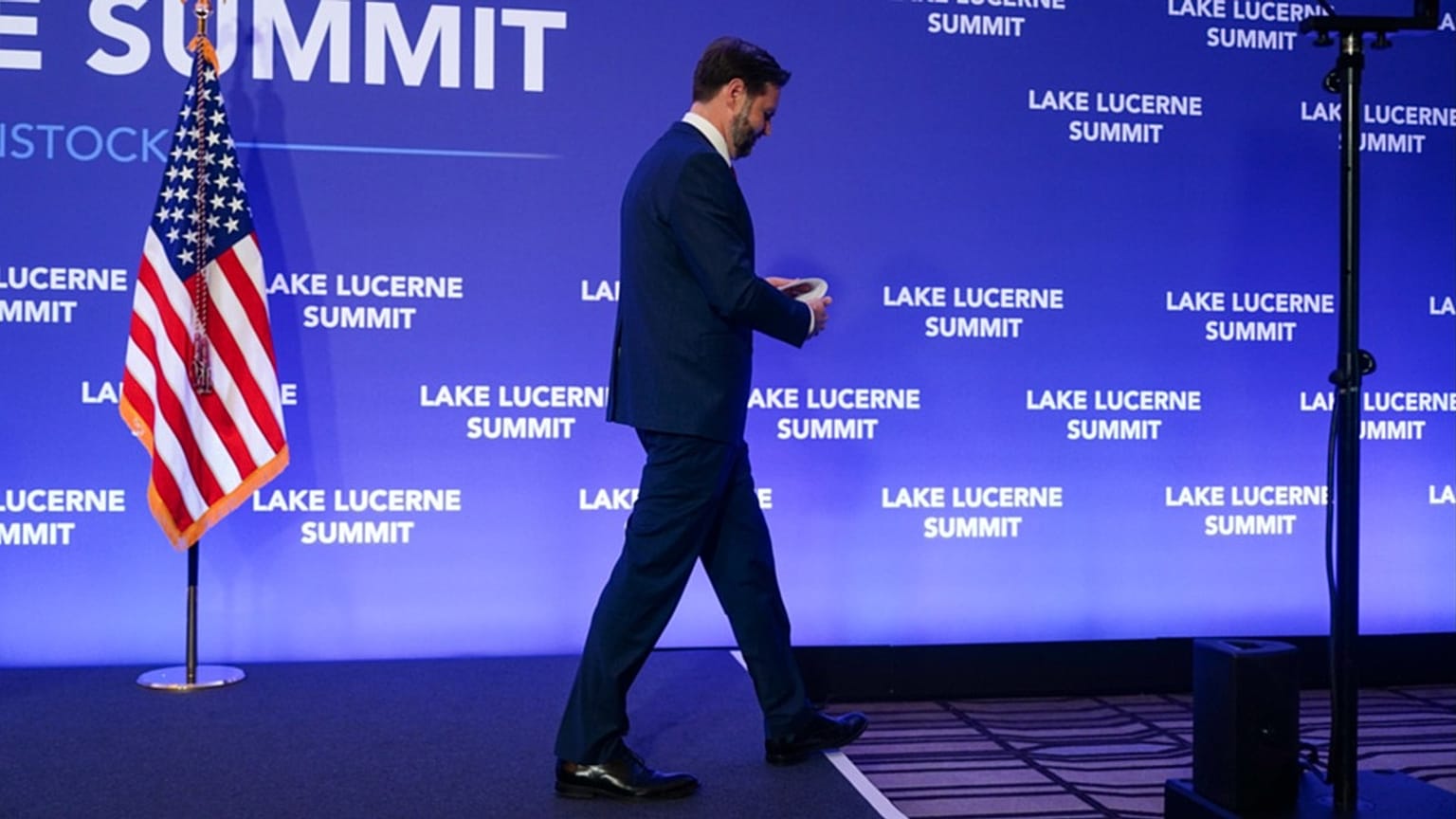 US VP JD Vance walks after speaking to members of the media following high-level talks between the US and Iran at the Bürgenstock Resort, in Switzerland, Monday, June 22, 2026