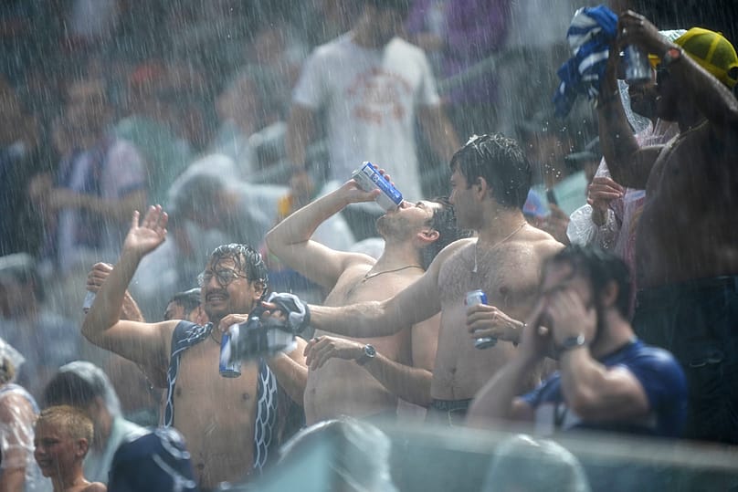 Fans react after a weather delay during the World Cup Group I match between France and Iraq in Philadelphia, Monday, June 22, 2026