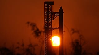 The sun rises behind SpaceX's mega rocket Starship as it is prepared for a test flight from Starbase, Texas, 22 May 2026