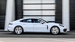 This photo provided by Porsche shows a 2020 Panamera. A plug-in hybrid version of a Panamera has less than 20 miles of all-electric range but fully delivers all of the refinem