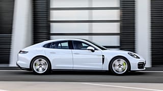 This photo provided by Porsche shows a 2020 Panamera. A plug-in hybrid version of a Panamera has less than 20 miles of all-electric range but fully delivers all of the refinem