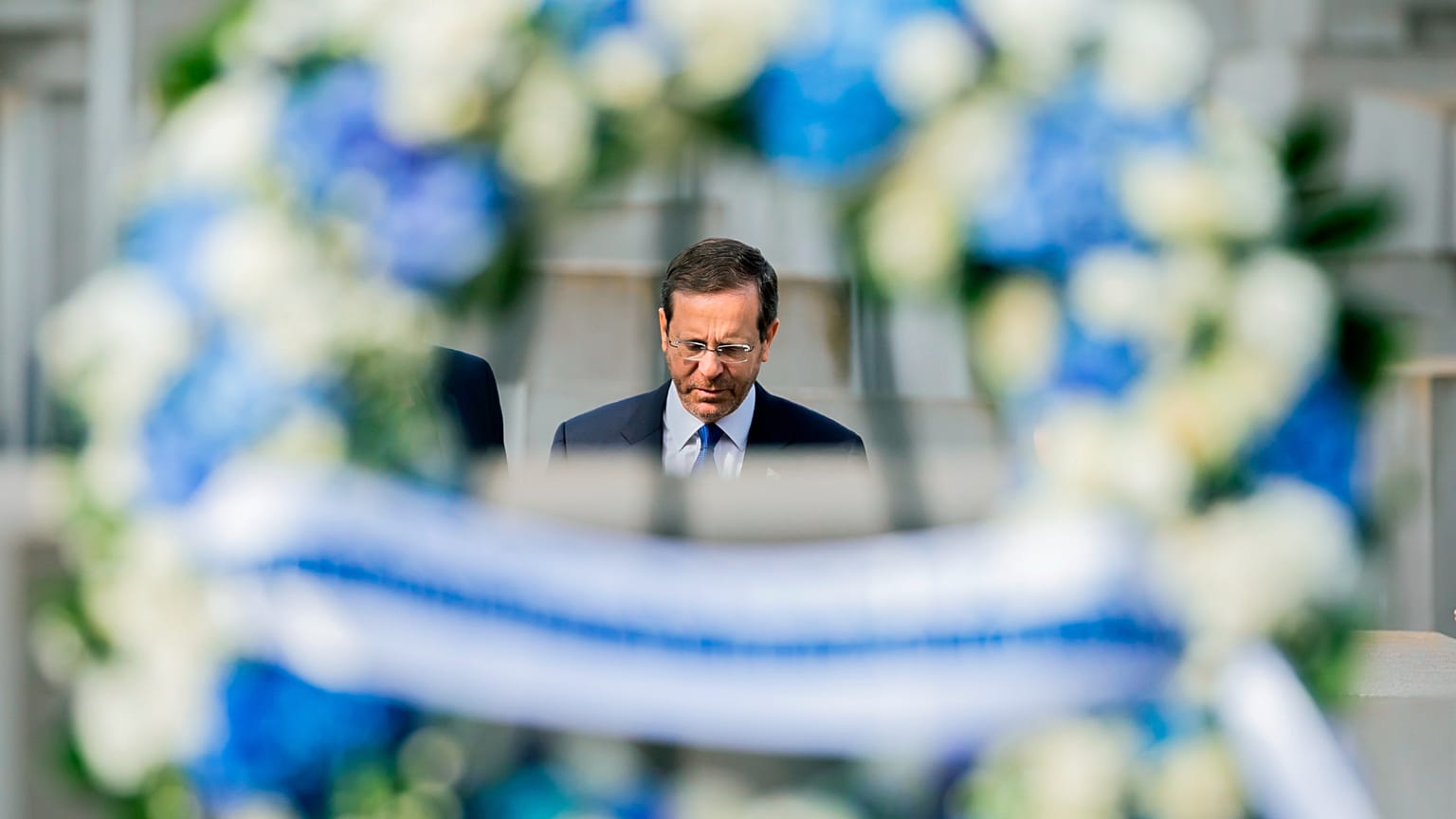 Israeli President Isaac Herzog attends a wreath laying ceremony at the Holocaust memorial in Berlin, Germany, Tuesday, Sept. 6, 2022