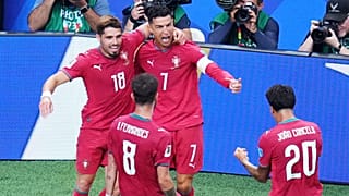 Portugal's Cristiano Ronaldo celebrates with Pedro Neto, Bruno Fernandes and Joao Cancelo  after scoring during the World Cup Group K match against Uzbekistan, June 23, 2026