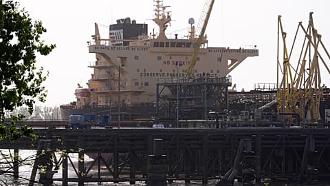 File - The crude oil tanker Dubai Attraction is moored in the Mississippi River at the IMTT dock in Saint Rose, La., Thursday, 2 April 2026.
