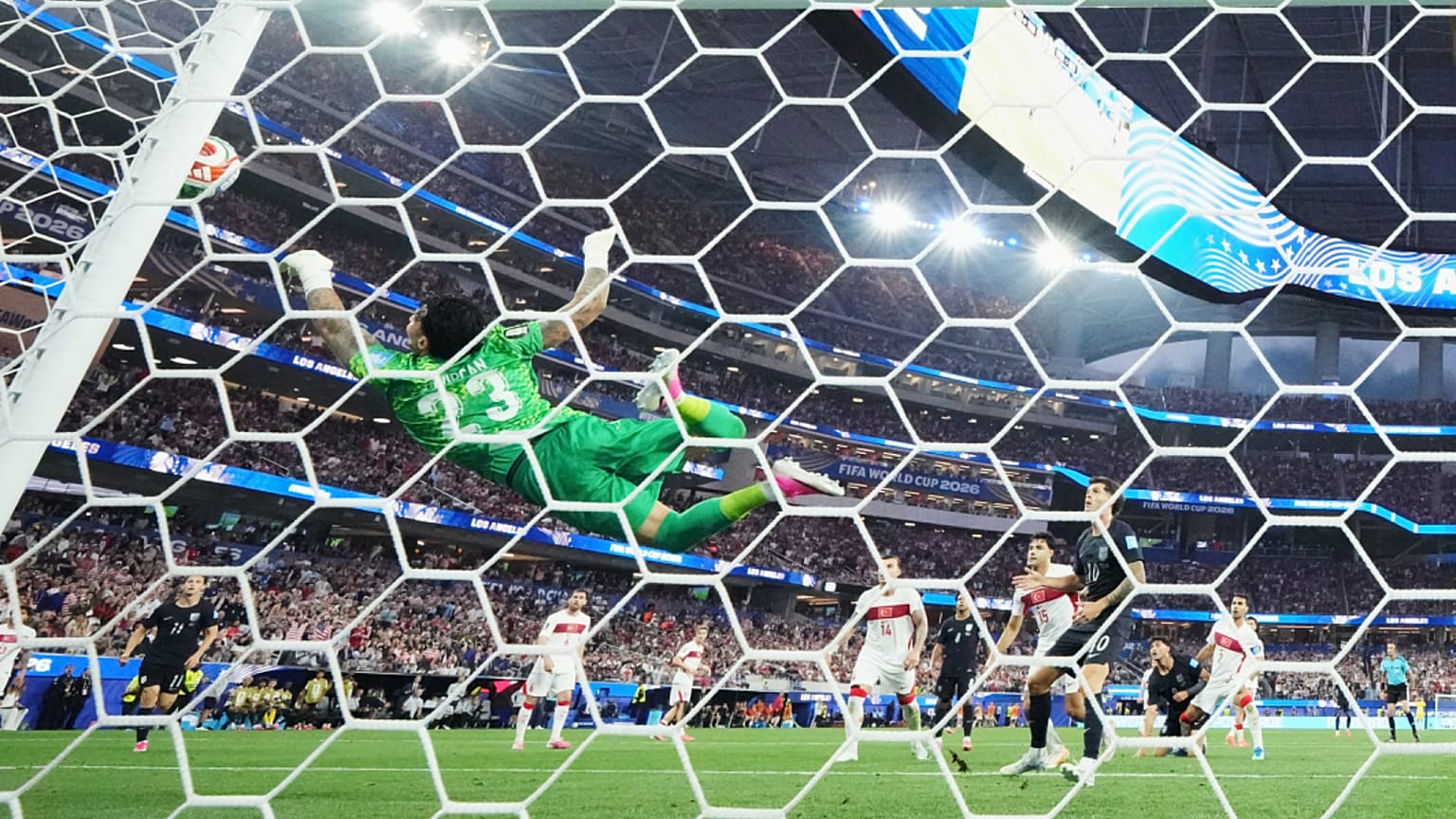 Turkey goalkeeper Ugurcan Cakir makes a diving save during the World Cup Group D soccer match between Turkey and the United States, 25 June 2026,