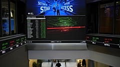 FTSE market information is displayed inside the London Stock Exchange, in the City of London, Monday, March 17, 2025. 