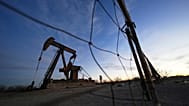 A pumpjack is visible before sunrise Feb. 26, 2025, in Kermit, Texas.