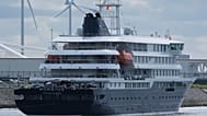 The MV Hondius cruise ship arrives at the Port of Rotterdam, Netherlands, Monday, May 18, 2026.