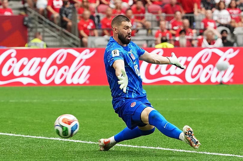 Canada goalkeeper Maxime Crepeau is scored on by Switzerland's Ruben Vargas during the World Cup Group B match against Switzerland in Vancouver, Wednesday, June 24, 2026