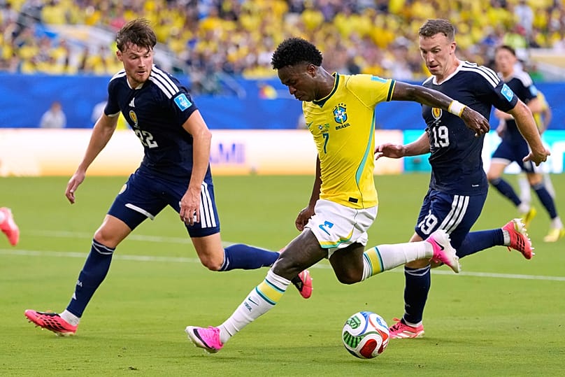 Brazil's Vinicius Junior battles for the ball during the World Cup Group C match against Scotland in Miami Gardens, Florida, Wednesday, June 24, 2026