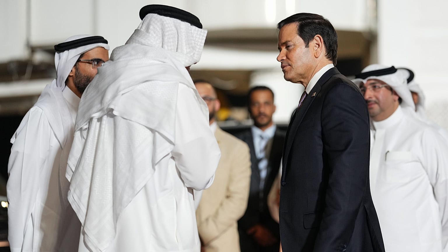 Bahrain's Foreign Minister Abdullatif bin Rashid Al Zayani speaks with US Secretary of State Marco Rubio, in Muharraq, near Manama, 24 June 2026