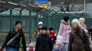 Ukrainian citizens at the border crossing in Medyka, Poland