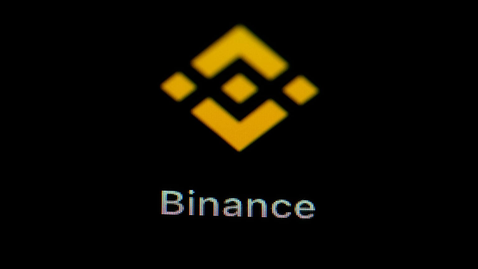 The Binance logo seen on a smartphone.