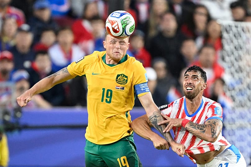 Australia's Harry Souttar battles for the ball with Paraguay's Gabriel Avalos during the World Cup Group D match in Santa Clara, California, Thursday, June 25, 2026