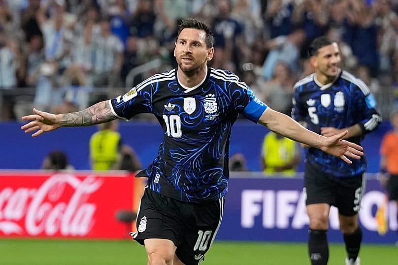 rgentina's Lionel Messi (10) celebrates scoring his side's 3rd goal during the World Cup Group J soccer match between Jordan and Argentina in Arlington, Texas, near Dallas.