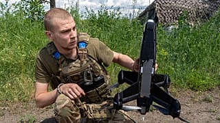 A Ukrainian serviceman of Khartia brigade launches an interceptor drone in Kharkiv region, Ukraine, Friday, June 26, 2026.