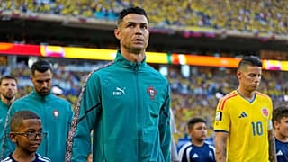Portugal's Cristiano Ronaldo (7) leads his players onto the field for the World Cup Group K soccer match between Colombia and Portugal in Miami Gardens, Fla.