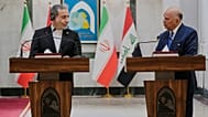 وزير الخارجية العراقي فؤاد حسين، على اليمين، يتحدث خلال مؤتمر صحفي مع نظيره الإيراني عباس عراقجي، عقب لقائهما في بغداد، العراق، الأحد 28 يونيو 2026. (AP Photo/هادي مزبان)