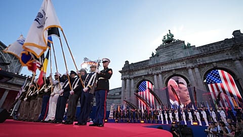 Members of the US armed forces march on stage during the America 250 event in Brussels, Sunday, June 28, 2026.