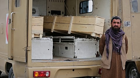 An ambulance carrying the coffins of alleged victims of airstrike in Kabul, Afghanistan, Tuesday, March 17, 2026