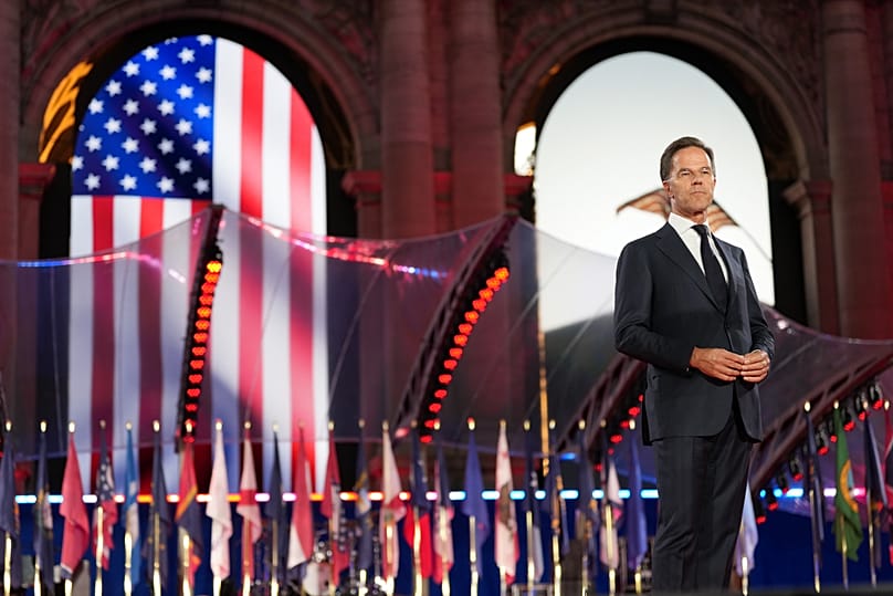 NATO Secretary General Mark Rutte prepares to deliver an address during the America 250 event in Brussels, Sunday, June 28, 2026. (AP Photo/Virginia Mayo)