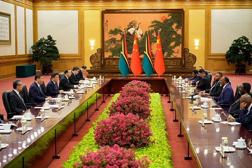 Vanuatu’s Prime Minister Charlot Salwai attends a meeting with Chinese President Xi Jinping at the Great Hall of the People in Beijing, 12 July, 2024