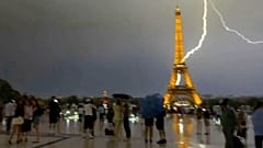 Lightning strikes Eiffel Tower as thunderstorm rages over Paris