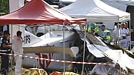 Des techniciens de la police scientifique examinent un avion de parachutisme qui s'est écrasé à Tomblaine, causant la mort des 11 personnes à bord, dimanche 28 juin 2026.