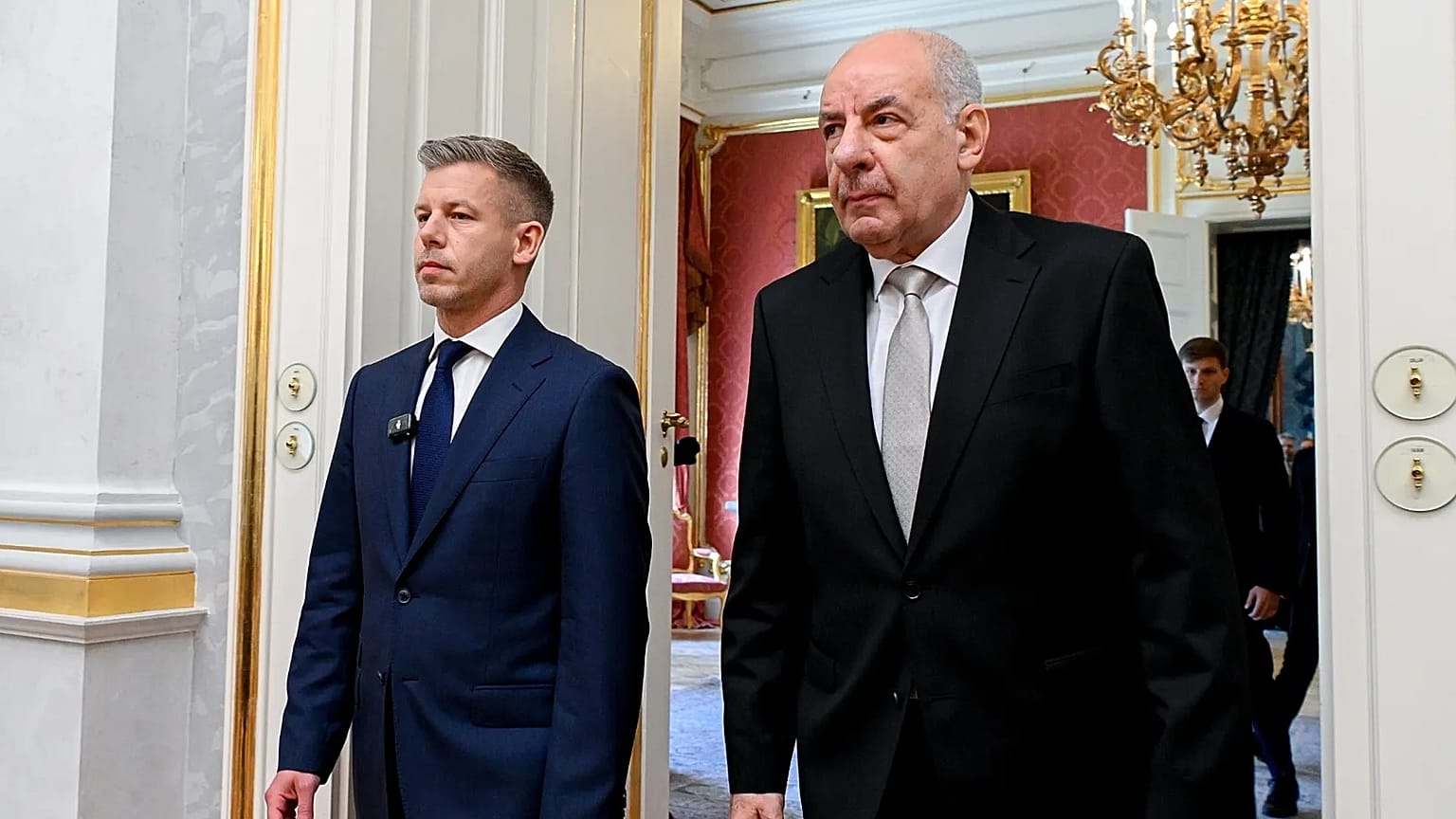 Hungary's president Tamas Sulyok, right, and prime minister Peter Magyar attend the swearing-in of ministers of the Tisza government at the presidential palace.