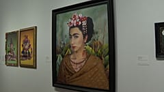 Image of ‘an Inner Dialogue with Frida Kahlo (Hand Shaped Earring)’ by Yasumasa Morimura exhibited at Tate Modern.