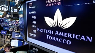 FILE. The logo for British American Tobacco appears above a trading post on the floor of the New York Stock Exchange, Jul. 2017