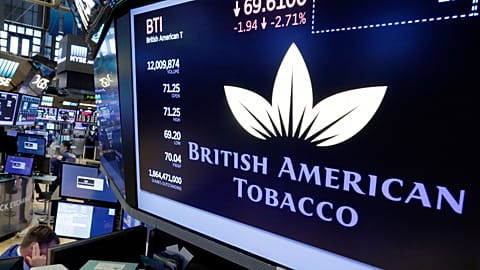 FILE. The logo for British American Tobacco appears above a trading post on the floor of the New York Stock Exchange, Jul. 2017