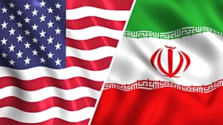 العلمان الأمريكي والإيراني