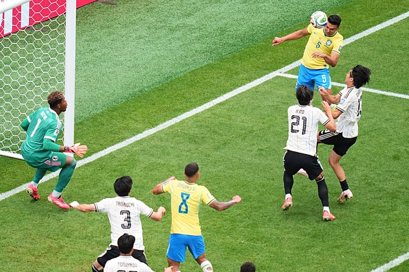 Brazil's Casemiro (5) scores his side's first goal during the World Cup round of 32 soccer match between Brazil and Japan