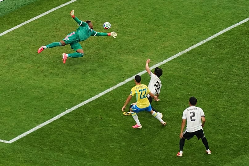Brazil's Gabriel Martinelli (22) scores their second goal during the World Cup round of 32