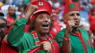 Morocco fans celebrate as the team advances to Round 16 of the World Cup