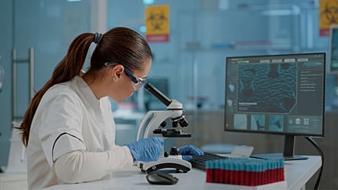 Illustration: Scientists conducting biomedical research in a laboratory.