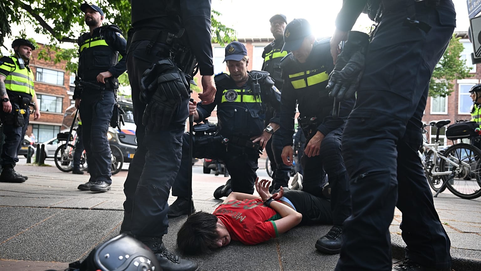 Police arrest a Moroccan fan after a World Cup match between the Netherlands and Morocco in The Hague, 30 June, 2026