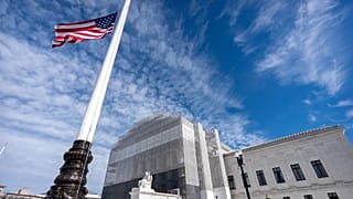 An American flag flies at half-staff outside the Supreme Court on5 November, 2025, in Washington.