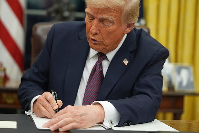 US President Donald Trump signs an executive order on birthright citizenship in the Oval Office of the White House in Washington, 20 Jan, 2025. 