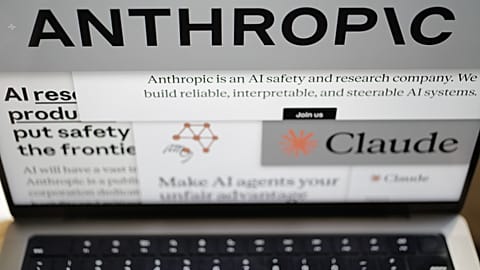 Pages from the Anthropic website and the company's logos are displayed on a computer screen in New York on Thursday, Feb. 26, 2026