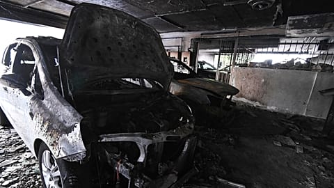 Burned vehicles following firebomb attacks that apparently targeted members of Greece's New Democracy party in Thessaloniki, 1 July, 2026