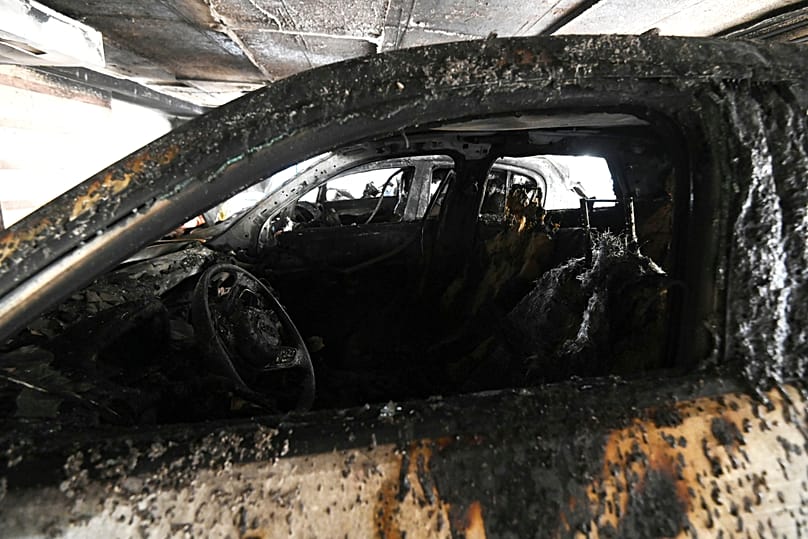 Burned vehicles following firebomb attacks that apparently targeted members of Greece's New Democracy party in Thessaloniki, 1 July, 2026