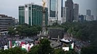 Soccer fans gather for a watch party for the World Cup soccer match between Mexico and Ecuador, at the base of the Angel of Independence monument in Mexico City, Tuesday.
