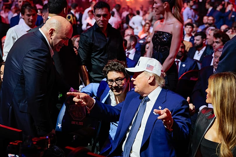 US President Donald Trump talking to UFC President Dana White, alongside US First Lady Melania Trump, during UFC Freedom 250 at the White House, 15 June 2026