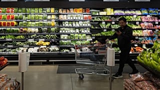A shopper shops at a grocery store in Schaumburg, Ill., Thursday, May 14, 2026.