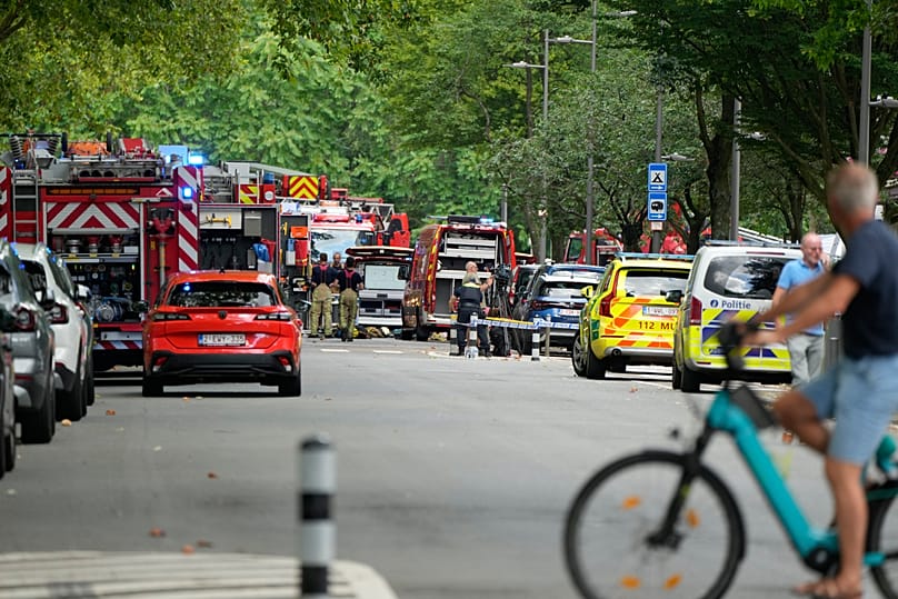 Emergency workers on the street after a fire broke out in an apartment block in Linkeroever, 1 July, 2026