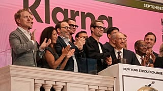 FILE. Klarna CEO Sebastian Siemiatkowski and company Chairman Michael Moritz shake hands as they ring the New York Stock Exchange opening bell, Sept. 2025