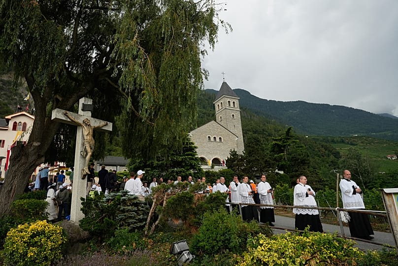 Clergy arrive in procession for a consecration ceremony for four new bishops at the Society of St. Pius X seminary in Econe, Switzerland, Wednesday, July 1, 2026.