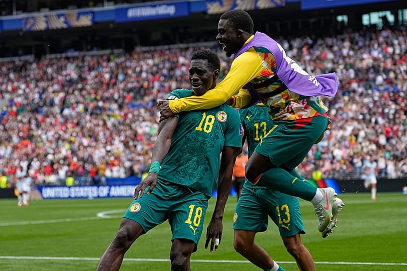 Senegal's Ismaila Sarr (18) is congratulated after scoring his side's 2nd goal during the World Cup round of 32 soccer match between Belgium and Senegal, Seattle, July 1, 2026